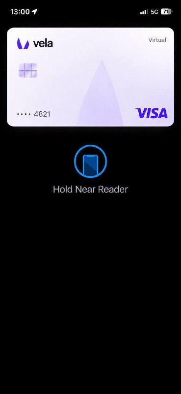 Apple Pay on an iPhone: the Vela card above the message Hold Near Reader.
